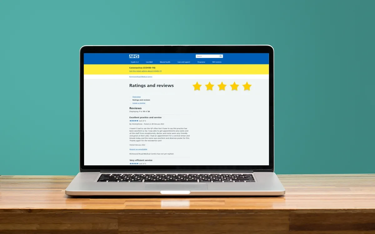 A 5 star review on the NHS website, being viewed on a laptop screen